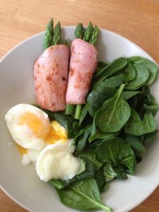 Soft boiled eggs, spinach and aspaagus